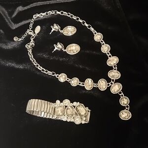 White House Black Market jewelry set includes necklace, earrings and bracelet.